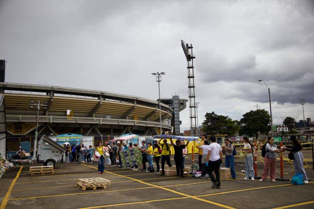 August 14, 2026, Bogota, Bogota D.C, Colombia: People in Bogota, Colombia gather to collect and categorize donations for the victims of the 7,4 earthquake that struck Colombia on August 10 outside El Campin Stadium on August 14, 2026. Bogota Colombia - ZUMAvp1_ 20260814_zia_vp1_036 Copyright: xIsabellaxBobadillax