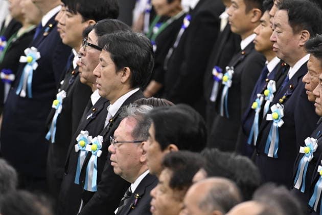 Japan commemorates war dead on 81st anniversary of end of World War II TOKYO, JAPAN - AUGUST 15 : Attendees stand at the beginning of the National Memorial Service for the War Dead at the Nippon Budokan in Tokyo, Japan, August 15, 2026. David Mareuil Anadolu Tokyo Japan. Editorial use only. Please get in touch for any other usage.  Copyright: x2026xAnadoluxDavidxMareuilx