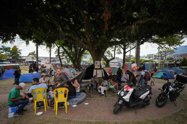 (260815) -- PEREIRA, Aug. 15, 2026 -- People rest at a temporary settlement at a park after an earthquake in Pereira, Colombia on Aug. 14, 2026. A 7.4-magnitude earthquake jolted western Colombia on Monday. (Photo by Xinhua) COLOMBIA-PEREIRA-EARTHQUAKE-AFTERMATH AndresxMoreno 