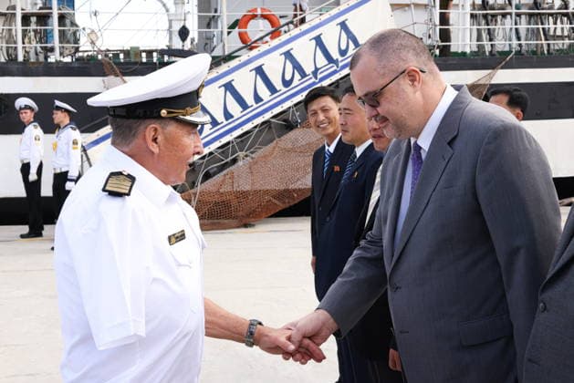 NORTH KOREA, WONSAN - AUGUST 15, 2026: The Pallada s Captain Nikolai Zorchenko (L) and Russia s Ambassador to DPRK Vladimir Topekha shake hands during a ceremony marking the arrival of the Russian training tallship Pallada. The ship arrived in the Democratic People s Republic of Korea on a friendly visit for festivities marking the 81st anniversary of the liberation of Korea from Japanese occupation, on 15 August. Stanislav Varivoda TASS  96176927