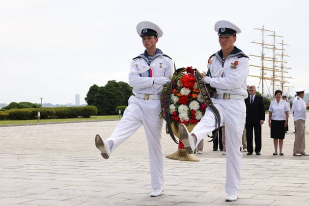 NORTH KOREA, WONSAN - AUGUST 15, 2026: Crew members take part in a wreath laying ceremony at the Wonsan Bronze Statues of Kim Il Sung and Kim Jong Il after the arrival of the Russian training tallship Pallada. The ship arrived in the Democratic People s Republic of Korea on a friendly visit for festivities marking the 81st anniversary of the liberation of Korea from Japanese occupation, on 15 August. Stanislav Varivoda TASS  96177054