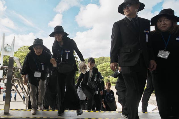 Bereaved families of the war dead are seen arrival before the memorial service for the war dead of World War II marking the 81st anniversary at Nippon Budokan in Tokyo, Japan on Saturday, August 15, 2026.  TKP2026081501 KEIZOxMORI