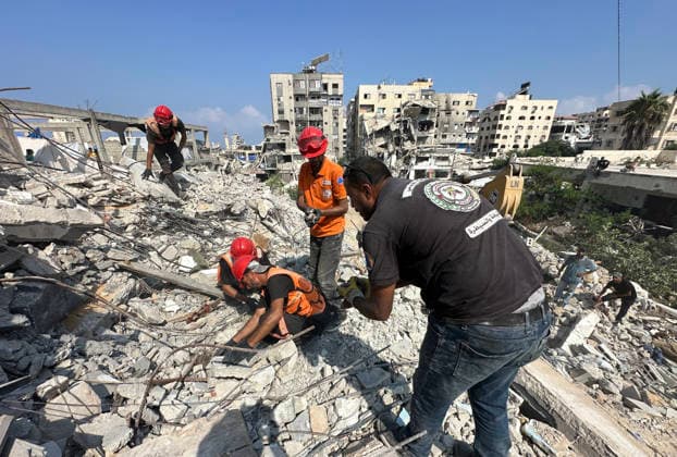 Palestinian Civil Defense Teams Recover Remains From Gaza Rubble Palestinian Civil Defense teams recover the remains of members of the Gharbiya and al-Shawa families during search operations beneath the rubble of a home destroyed in an Israeli airstrike during the war in the al-Rimal neighborhood of Gaza City, on August 15, 2026. Search and recovery operations continued for a third consecutive day with limited resources in an effort to retrieve additional bodies trapped beneath the rubble. Photo by Mekael Bhar apaimages Gaza city Gaza Strip Palestinian Territory 150826_Gaza_MB_00(3) Copyright: xapaimagesxMekaelxBharx xapaimagesx