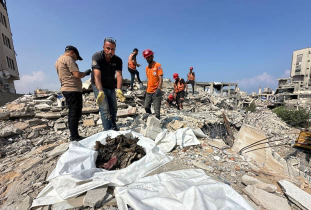 Palestinian Civil Defense Teams Recover Remains From Gaza Rubble Palestinian Civil Defense teams recover the remains of members of the Gharbiya and al-Shawa families during search operations beneath the rubble of a home destroyed in an Israeli airstrike during the war in the al-Rimal neighborhood of Gaza City, on August 15, 2026. Search and recovery operations continued for a third consecutive day with limited resources in an effort to retrieve additional bodies trapped beneath the rubble. Photo by Mekael Bhar apaimages Gaza city Gaza Strip Palestinian Territory 150826_Gaza_MB_00(4) Copyright: xapaimagesxMekaelxBharx xapaimagesx