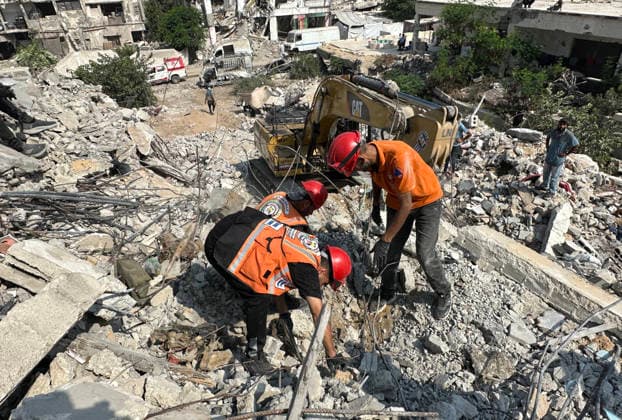 Palestinian Civil Defense Teams Recover Remains From Gaza Rubble Palestinian Civil Defense teams recover the remains of members of the Gharbiya and al-Shawa families during search operations beneath the rubble of a home destroyed in an Israeli airstrike during the war in the al-Rimal neighborhood of Gaza City, on August 15, 2026. Search and recovery operations continued for a third consecutive day with limited resources in an effort to retrieve additional bodies trapped beneath the rubble. Photo by Mekael Bhar apaimages Gaza city Gaza Strip Palestinian Territory 150826_Gaza_MB_00(5) Copyright: xapaimagesxMekaelxBharx xapaimagesx