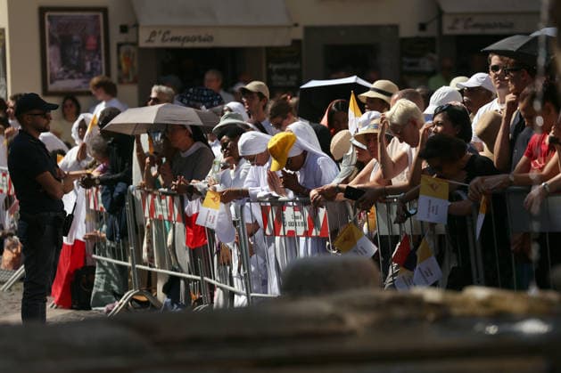 IPA87496298 - Vatican City - Italy, August 15, 2026: The faithful and members of religious orders gather in prayer to attend Mass. Pope Leo XIV presides over Mass for the Solemnity of the Assumption at the Pontifical Parish of St. Thomas of Villanova, in the town of Castelli Romani.  Copyright: xmarcoxiacobuccix xmarcoxiacobuccix 87496298