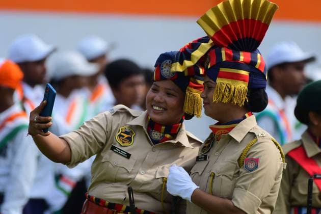 (260815) -- ASSAM, Aug. 15, 2026 -- Indian policewomen take selfies during India s Independence Day celebrations in Nagaon district of India s northeastern state of Assam, Aug. 15, 2026. (Str Xinhua) INDIA-ASSAM-INDEPENDENCE DAY CELEBRATIONS JavedxDar 