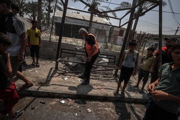 Israel launches airstrike on Gaza despite ceasefire DEIR AL-BALAH, GAZA, PALESTINE - AUGUST 15: Palestinians inspect the area following an Israeli drone strike on a motorcycle along Salah al-Din Street in Deir al-Balah in the central Gaza, Palestine, on August 15, 2026. Ali Jadallah Anadolu Deyr Balah Palestinian Territory, Occupied. Editorial use only. Please get in touch for any other usage.  Copyright: x2026xAnadoluxAlixJadallahx