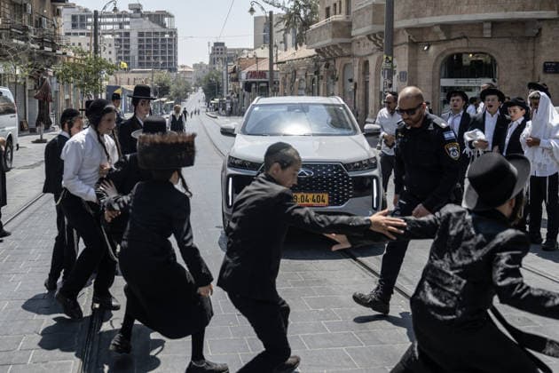 Ultra-Orthodox Jews protest outside cafe over alleged Shabbat violation in Israel JERUSALEM - AUGUST 15: Ultra-Orthodox Jews protest outside the Bastima cafe in West Jerusalem on August 15, 2026, saying the cafe was open on Saturday during Shabbat, when work is prohibited according to their religious beliefs. Mostafa Alkharouf Anadolu Jerusalem Jerusalem. Editorial use only. Please get in touch for any other usage.  Copyright: x2026xAnadoluxMostafaxAlkharoufx