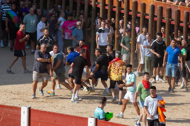 August 15, 2026, Penafiel, Valladolid, USA: An injured man is is evacuated by villagers during the Capea Suelta de Novillos at the Fiestas de Nuestra Senora y San Roque in Penafiel, Spain on Saturday, August 15, 2026. The event allows amateurs to spend time with the younger bulls in the ring before the commencement of the formal bullfights later in the day. The annual festival, taking place this year on August 14-18, includes traditional processions, bullfighting and lively celebrations. Penafiel USA - ZUMAg235 20260815_zap_g235_017 Copyright: xPaulxChristianxGordonx