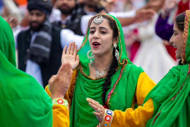 August 15, 2026, Srinagar, Jammu And Kashmir, India: Girls dance before bureaucrats and ministers during a ceremony marking India™s 80th Independence Day at Bakshi Stadium in Srinagar, the summer capital of Jammu and Kashmir. The ceremony included the unfurling of the national flag, a ceremonial parade and cultural performances. Srinagar India - ZUMAs197 20260815_aaa_s197_045 Copyright: xFaisalxBashirx
