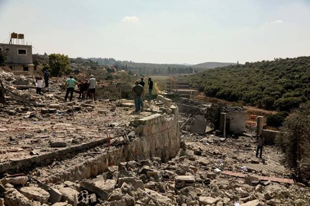 August 15, 2026, Ansar, Ansar, Lebanon: People inspect destruction caused by an Israeli air strike in the southern Lebanese village of Ansar. Seven people were killed and three other wounded in the attack, one of the deadliest attacks since a precarious truce between Israel and pro-Iranian Hezbollah went into effect on June 20. Ansar Lebanon  - ZUMAn313 20260815_zip_n313_004 Copyright: xMarwanxNaamanix