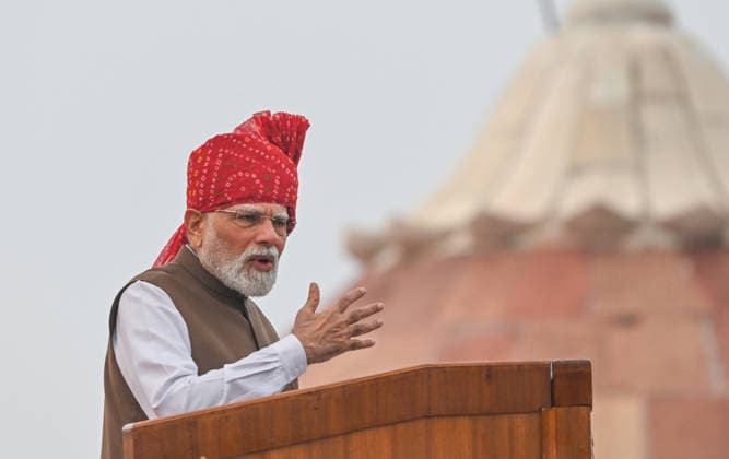 NEW DELHI, INDIA - AUGUST 15: Prime Minister Narendra Modi delivers his Independence Day speech from the Red Fort during the 80th Independence Day celebrations at Red Fort on August 15, 2026 in New Delhi, India. For the first time, the national song, Vande Mataram , was rendered during the celebrations at the Red Fort. The National Anthem rendition was synchronised with the 21-gun salute by the gunners of the 1721 Field Battery (Ceremonial), utilising the indigenous 105mm Light Field Guns. PM Modi announced a nationwide initiative to provide free online coaching for competitive exams during his Independence Day address on August 15, 2026. The scheme aims to leverage India s digital infrastructure and top educators to ease the heavy financi