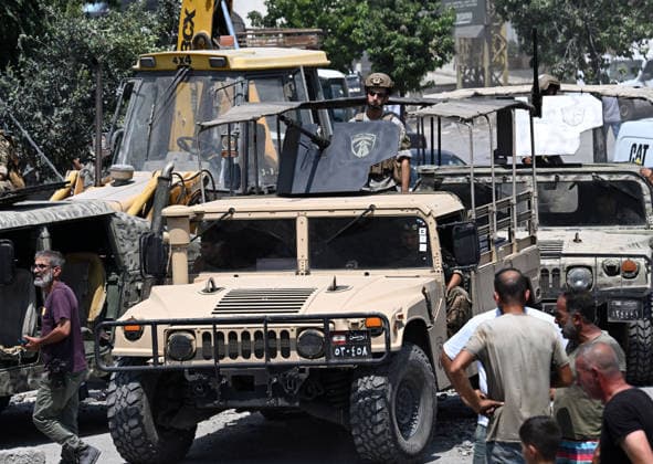 At least 11 killed in Israeli attack on southern Lebanon DEIR EZ-ZAHRANI, LEBANON - AUGUST 15: Soldiers arrive to the area affected by the Israeli airstrike on Deir ez-Zahrani, where at least 11 people were killed, in Lebanon on August 15, 2026. Houssam Shbaro Anadolu Deir ez-Zahrani Lebanon. Editorial use only. Please get in touch for any other usage.  Copyright: x2026xAnadoluxHoussamxShbarox