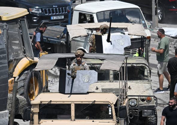 At least 11 killed in Israeli attack on southern Lebanon DEIR EZ-ZAHRANI, LEBANON - AUGUST 15: Soldiers arrive to the area affected by the Israeli airstrike on Deir ez-Zahrani, where at least 11 people were killed, in Lebanon on August 15, 2026. Houssam Shbaro Anadolu Deir ez-Zahrani Lebanon. Editorial use only. Please get in touch for any other usage.  Copyright: x2026xAnadoluxHoussamxShbarox