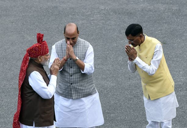 80th Independence Day celebrations at Red Fort New Delhi, Aug 15 (ANI): Prime Minister Narendra Modi exchanges greetings with Defence Minister Rajnath Singh and MoS Defence Sanjay Seth as he arrives to hoist the national flag on the 80th Independence Day, at Red Fort in New Delhi on Saturday. NEW DELHI Delhi India Copyright: xANIx ANI_20260815224