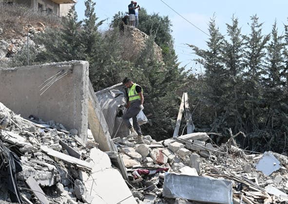 Israeli warplanes carried out airstrikes on towns in southern Lebanon despite the ceasefire NABATIEH GOVERNORATE, LEBANON - AUGUST 15: A general view of widespread destruction and piles of rubble following an Israeli airstrike on the town of Ansar in the Nabatieh Governorate, southern Lebanon, on August 15, 2026. At least seven people were killed and three others injured when an early morning air raid targeted a residential area, leaving severe structural damage across the neighborhood. Houssam Shbaro Anadolu Nabatieh Lebanon. Editorial use only. Please get in touch for any other usage.  Copyright: x2026xAnadoluxHoussamxShbarox