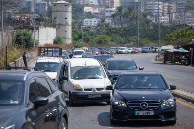 Lebanese families flee north as Israeli strikes persist despite ceasefire SIDON, LEBANON - AUGUST 15: Traffic backs up along roads in Sidon, southern Lebanon, on August 15, 2026, as families flee their homes in vehicles following continued Israeli military strikes despite a ceasefire agreement. Displaced residents packed personal belongings into cars and trucks, creating major gridlock through the port city as they sought safety in regions further north. Mohammad Abushama Anadolu Sidon Lebanon. Editorial use only. Please get in touch for any other usage.  Copyright: x2026xAnadoluxMohammadxAbushamax