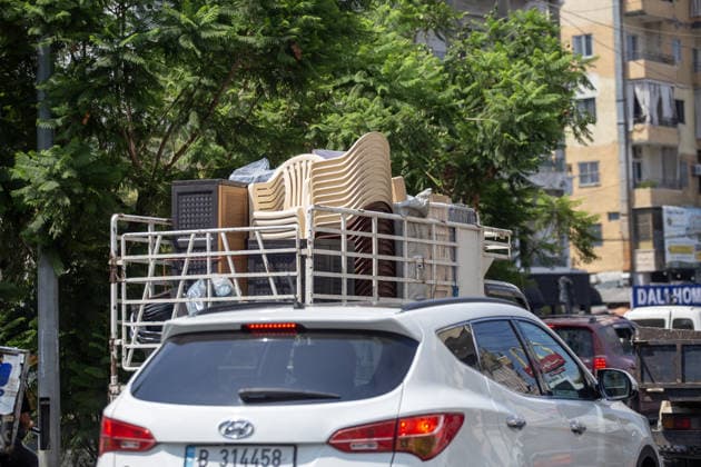 Lebanese families flee north as Israeli strikes persist despite ceasefire SIDON, LEBANON - AUGUST 15: Traffic backs up along roads in Sidon, southern Lebanon, on August 15, 2026, as families flee their homes in vehicles following continued Israeli military strikes despite a ceasefire agreement. Displaced residents packed personal belongings into cars and trucks, creating major gridlock through the port city as they sought safety in regions further north. Mohammad Abushama Anadolu Sidon Lebanon. Editorial use only. Please get in touch for any other usage.  Copyright: x2026xAnadoluxMohammadxAbushamax