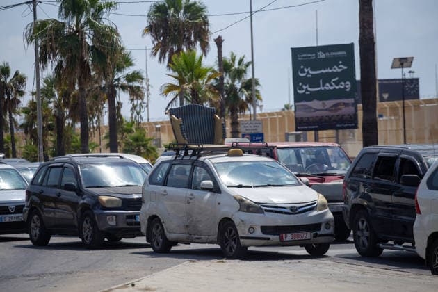 Lebanese families flee north as Israeli strikes persist despite ceasefire SIDON, LEBANON - AUGUST 15: Traffic backs up along roads in Sidon, southern Lebanon, on August 15, 2026, as families flee their homes in vehicles following continued Israeli military strikes despite a ceasefire agreement. Displaced residents packed personal belongings into cars and trucks, creating major gridlock through the port city as they sought safety in regions further north. Mohammad Abushama Anadolu Sidon Lebanon. Editorial use only. Please get in touch for any other usage.  Copyright: x2026xAnadoluxMohammadxAbushamax