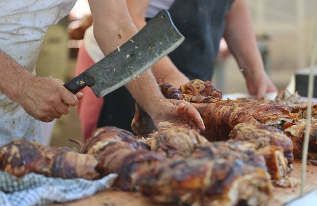 Blessed Virgin Mary celebration in Croatia Vendors sell spit roast pork during a Feast of Assumption of the Blessed Virgin Mary celebration in Sinj, Croatia on August 15, 2026.  IvoxCagalj PIXSELL