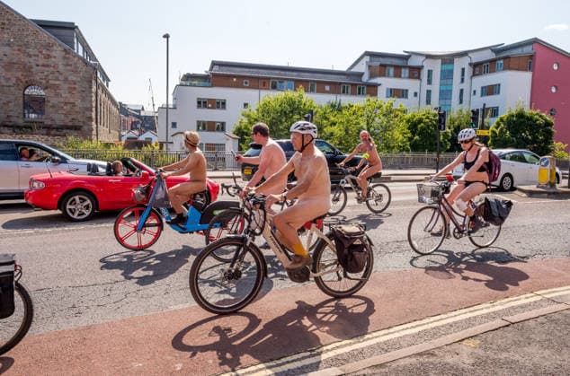 August 15, 2026, Bristol, Bristol, UK: Bristol, UK. NOTE: images contain nudity. The Bristol World Naked Bike Ride takes place around the city in warm sunny weather after the recent heatwave. Naked bike rides are a protest demonstrating the vulnerability of cyclists, protesting against climate change, championing greener transport and protesting against oil dependency, fossil fuels and other forms of non-renewable energy, and celebrating the power and individuality of bodies as body positivity. Bristol UK  - ZUMAl94_ 20260815_zaf_l94_005 Copyright: xSimonxChapmanx