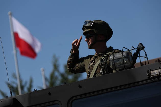 Polish Armed Forces Day Celebrated in Warsaw WARSAW, POLAND - AUGUST 15: A soldier salutes during a military parade on Polish Armed Forces Day in Warsaw, Poland on 15th August, 2026. Every year on 15 August Poland commemorates the Battle of Warsaw, also known as the Miracle on the Vistula. In 1920, the Polish army stopped Soviet troops, preventing their aggression against Europe. Beata Zawrzel Anadolu Warsaw Poland. Editorial use only. Please get in touch for any other usage.  Copyright: x2026xAnadoluxBeataxZawrzelx