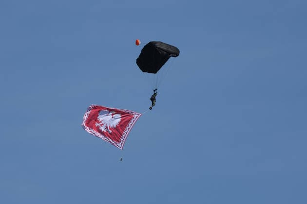 Polish Armed Forces Day Celebrated in Warsaw WARSAW, POLAND - AUGUST 15: A paratrooper flies during a military parade on Polish Armed Forces Day in Warsaw, Poland on 15th August, 2026. Every year on 15 August Poland commemorates the Battle of Warsaw, also known as the Miracle on the Vistula. In 1920, the Polish army stopped Soviet troops, preventing their aggression against Europe. Beata Zawrzel Anadolu Warsaw Poland. Editorial use only. Please get in touch for any other usage.  Copyright: x2026xAnadoluxBeataxZawrzelx