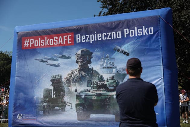 Polish Armed Forces Day Celebrated in Warsaw WARSAW, POLAND - AUGUST 15: A poster is seen during a military parade on Polish Armed Forces Day in Warsaw, Poland on 15th August, 2026. Every year on 15 August Poland commemorates the Battle of Warsaw, also known as the Miracle on the Vistula. In 1920, the Polish army stopped Soviet troops, preventing their aggression against Europe. Beata Zawrzel Anadolu Warsaw Poland. Editorial use only. Please get in touch for any other usage.  Copyright: x2026xAnadoluxBeataxZawrzelx