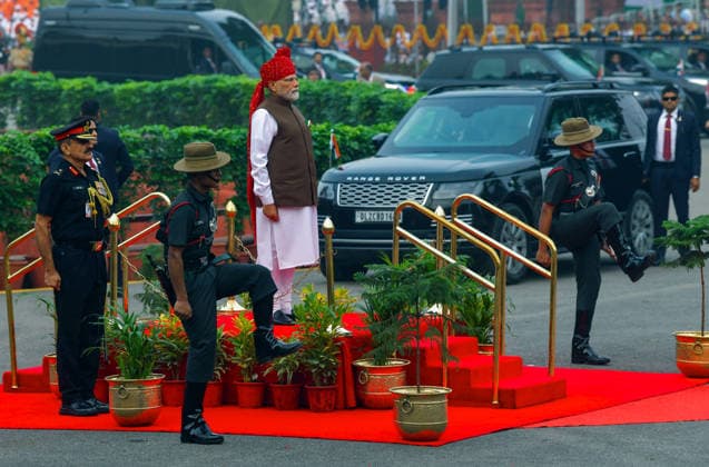 80th Independence Day Celebrations in New Delhi New Delhi, Aug 15 (ANI): Prime Minister Narendra Modi stands on the saluting dais as he receives the Guard of Honour during the 80th Independence Day celebrations at the Red Fort, in New Delhi on Saturday. NEW DELHI Delhi India Copyright: xANIx ANI_20260815660