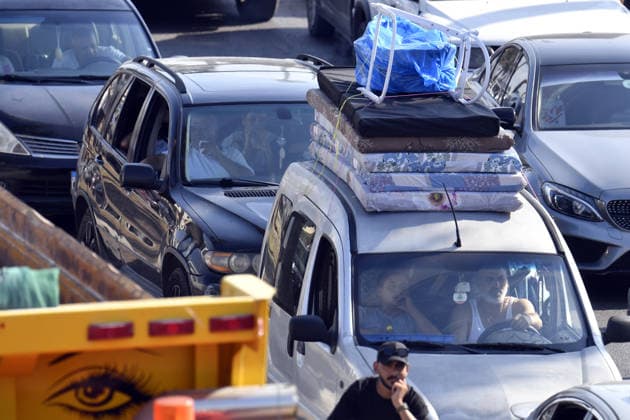 A new wave of displacement has begun following attacks launched by Israel on southern Lebanon, despite the ceasefire SIDON, LEBANON - AUGUST 15: Lebanese families drive through the streets of Sidon (Saida), southern Lebanon, with their vehicles packed with personal belongings as they head north toward safer areas on August 15, 2026. Heavy traffic and gridlock mounted along main coastal roads as civilians fled continued Israeli strikes on southern Lebanese towns despite the existing ceasefire agreement, causing renewed waves of internal displacement across the country. Houssam Shbaro Anadolu Sidon Lebanon. Editorial use only. Please get in touch for any other usage.  Copyright: x2026xAnadoluxHoussamxShbarox