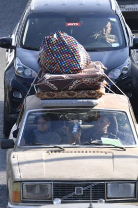 A new wave of displacement has begun following attacks launched by Israel on southern Lebanon, despite the ceasefire SIDON, LEBANON - AUGUST 15: Lebanese families drive through the streets of Sidon (Saida), southern Lebanon, with their vehicles packed with personal belongings as they head north toward safer areas on August 15, 2026. Heavy traffic and gridlock mounted along main coastal roads as civilians fled continued Israeli strikes on southern Lebanese towns despite the existing ceasefire agreement, causing renewed waves of internal displacement across the country. Houssam Shbaro Anadolu Sidon Lebanon. Editorial use only. Please get in touch for any other usage.  Copyright: x2026xAnadoluxHoussamxShbarox