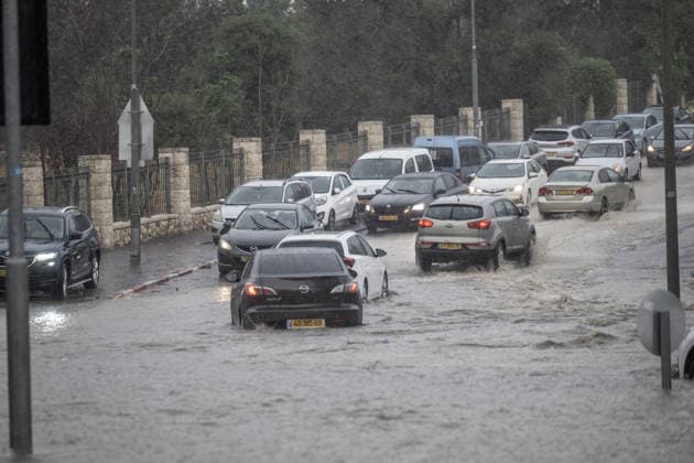 Flash floods submerge vehicles in East Jerusalem neighborhood following heavy rainfall EAST JERUSALEM - AUGUST 15: Submerged vehicles are seen in the Wadi al-Joz neighborhood of East Jerusalem on August 15, 2026, after unseasonal heavy rainfall triggered localized flash flooding across the area. Search and rescue teams were dispatched to the district as rising waters trapped cars, disrupted traffic flow, and damaged infrastructure across low-lying urban streets. Mostafa Alkharouf Anadolu Jerusalem Israel. Editorial use only. Please get in touch for any other usage.  Copyright: x2026xAnadoluxMostafaxAlkharoufx