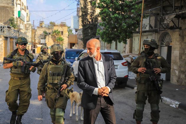 Israeli settlers raid historic Old City of Hebron in West Bank under military escort HEBRON, WEST BANK, PALESTINE - AUGUST 15: Israeli military personnel restrict the movement of local Palestinians during a raid by Israeli settlers in the Old City of Hebron, located in the southern West Bank, Palestine on August 15, 2026. Escorted by armed Israeli forces, the settlers entered the historic district while soldiers blocked key entry and exit points, severely limiting the daily mobility and access of Palestinian residents living in the area. Amer Shallodi Anadolu Hebron West Bank. Editorial use only. Please get in touch for any other usage.  Copyright: x2026xAnadoluxAmerxShallodix