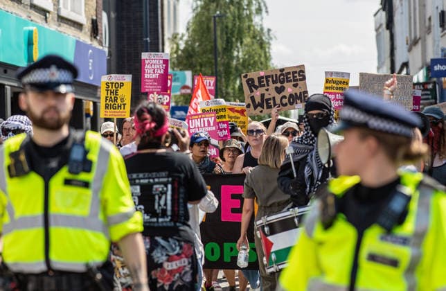 Anti-immigration demonstrators and Stand Up to Racism counter-protesters rally in Maidstone MAIDSTONE, UNITED KINGDOM - AUGUST 15: Activists from Stand Up to Racism assemble outside County Hall in Maidstone, Kent, United Kingdom, on August 15, 2026, to counter-protest against the far-right Kent Nationalist Movement as they gathered before marching through the town center. While the far-right group voiced opposition to government border policies, asylum seeker housing programs, and mass migration, Stand Up to Racism demonstrators chanted slogans and displayed placards to denounce far-right activity and express solidarity with refugees, with police officers maintaining a presence to keep the opposing groups separated. Stuart Brock Anadolu M  Copyright: x2026xAnadoluxStuartxBrockx