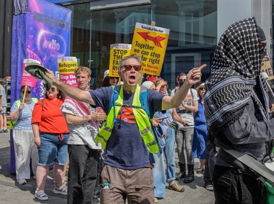 Anti-immigration demonstrators and Stand Up to Racism counter-protesters rally in Maidstone MAIDSTONE, UNITED KINGDOM - AUGUST 15: Activists from Stand Up to Racism assemble outside County Hall in Maidstone, Kent, United Kingdom, on August 15, 2026, to counter-protest against the far-right Kent Nationalist Movement as they gathered before marching through the town center. While the far-right group voiced opposition to government border policies, asylum seeker housing programs, and mass migration, Stand Up to Racism demonstrators chanted slogans and displayed placards to denounce far-right activity and express solidarity with refugees, with police officers maintaining a presence to keep the opposing groups separated. Stuart Brock Anadolu M  Copyright: x2026xAnadoluxStuartxBrockx