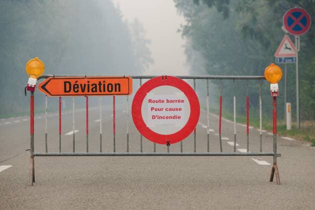 A road is closed as a fire rages in the Hautes Fagnes (High Fens) nature reserve, on Saturday 15 August 2026 in Jalhay. The fire started on August 14th and 1600 hectares (on a total of 4500) are impacted.  NICOLASxLAMBERT 183460015