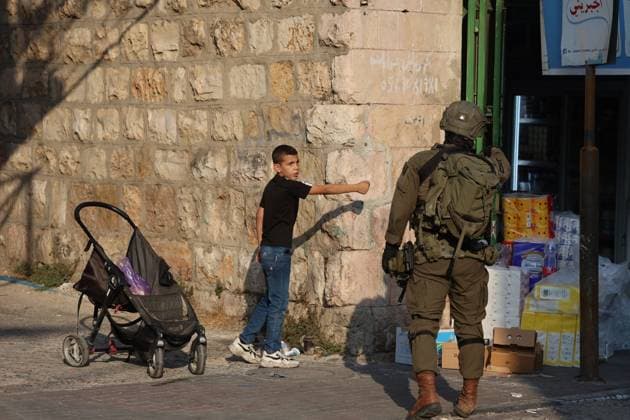 Israeli settlers enter Hebron™s Old City under army protection HEBRON, WEST BANK, PALESTINE, AUGUST 15, 2026: Israeli settlers enter the Old City of Hebron under the protection of Israeli soldiers, while Palestinians, including women and children, are prevented from reaching their homes. The incident took place amid heightened tensions in the occupied West Bank. HEBRON Palestine, State of Copyright: x xMosabxshawerx xJNAxPressx