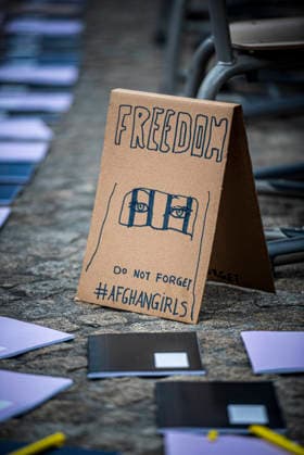 August 15, 2026, Amsterdam, North Holland, The Netherlands Holland: A protest sign reading Freedom - Do Not Forget - AFGHANGIRLS is displayed. August 15, 2026, Amsterdam, The Netherlands. Demonstrators gathered on Dam Square, Amsterdam, in solidarity with Afghan women and girls. The protest marked five years of Taliban rule and demanded access to education for women and girls be restored, and an end to Brussels engagement with the Taliban regime. Amsterdam The Netherlands Holland - ZUMAp202 20260815_zip_p202_001 Copyright: xJamesxPetermeierx