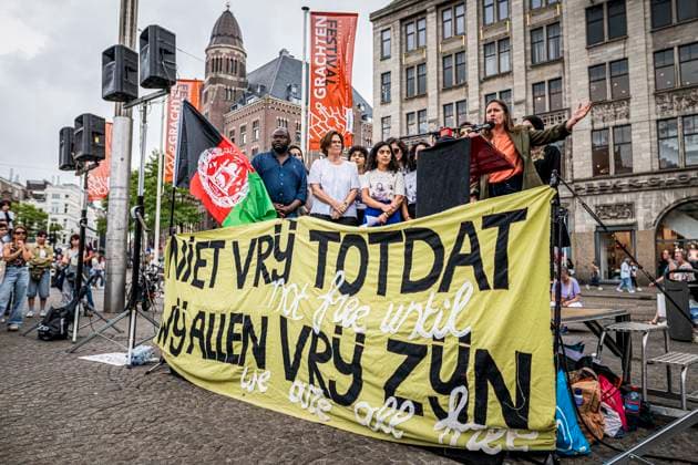August 15, 2026, Amsterdam, North Holland, The Netherlands Holland: Writers of a manifesto on Afghan women s rights speak. August 15, 2026, Amsterdam, The Netherlands. Demonstrators gathered on Dam Square, Amsterdam, in solidarity with Afghan women and girls. The protest marked five years of Taliban rule and demanded access to education for women and girls be restored, and an end to Brussels engagement with the Taliban regime. Amsterdam The Netherlands Holland  - ZUMAp202 20260815_zip_p202_018 Copyright: xJamesxPetermeierx