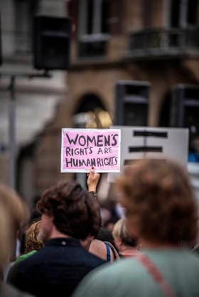 August 15, 2026, Amsterdam, North Holland, The Netherlands Holland: A demonstrator holds a sign reading Ã¢â‚¬oeWomen s Rights are Human RightsÃ¢â‚¬Â. August 15, 2026, Amsterdam, The Netherlands. Demonstrators gathered on Dam Square, Amsterdam, in solidarity with Afghan women and girls. The protest marked five years of Taliban rule and demanded access to education for women and girls be restored, and an end to Brussels engagement with the Taliban regime. Amsterdam The Netherlands Holland - ZUMAp202 20260815_zip_p202_020 Copyright: xJamesxPetermeierx