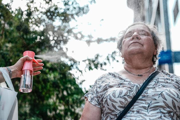 Heatwave in France s Nancy NANCY, FRANCE - AUGUST 15: A woman tries to cool off with a bottle spray during heatwave in Nancy, France on August 15, 2026. Muhammed Said Tako Anadolu Nancy France. Editorial use only. Please get in touch for any other usage.  Copyright: x2026xAnadoluxMuhammedxSaidxTakox