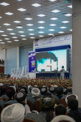 News Bilder des Tages Taliban Fifth Anniversary Official Ceremony Kabul Afghanistan Taliban members watch footage of the September 11 attacks on a screen during a ceremony at the Loya Jirga Tent to mark the fifth anniversary of their return to power in Kabul, Afghanistan, on August 15, 2026. The event commemorates the government s takeover following the withdrawal of United States forces. Kabul Kabul Afghanistan Copyright: xJavidxAshnax