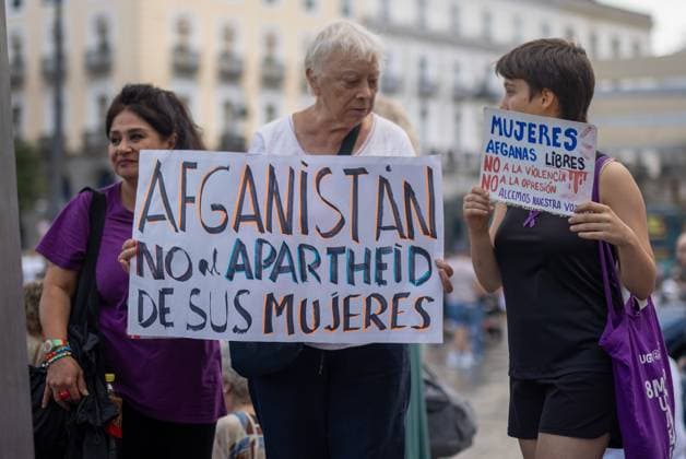 August 15, 2026, Madrid, Spain: Protesters carry banners during a rally in Madrid s Puerta del Sol, Afghan women asylum seekers and feminist groups gathered to commemorate the five-year anniversary of the Taliban s return to power in Afghanistan, following the withdrawal of US and NATO troops and the resulting setbacks in human rights and the rise of gender apartheid. Madrid Spain - ZUMAs197 20260815_aaa_s197_100 Copyright: xDavidxCanalesx