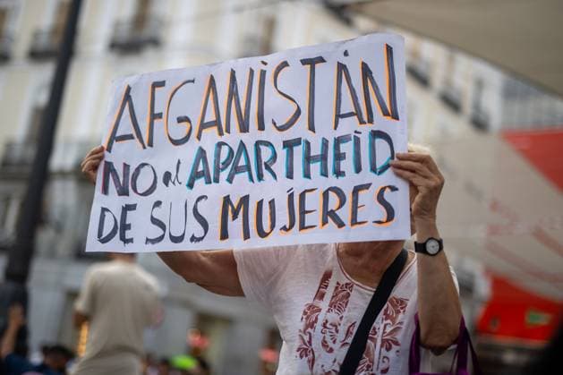August 15, 2026, Madrid, Spain: MADRID, SPAIN Ã¢â‚¬ AUGUST 15, 2026: Afghan women, asylum seekers and feminist groups gather at Puerta del Sol in Madrid, Spain, on August 15, 2026, to mark five years since the Taliban returned to power in Afghanistan following the withdrawal of U.S. and NATO forces. Demonstrators denounced restrictions imposed on women and girls under Taliban rule and called for international action to defend their rights, describing the system of restrictions as Ã¢â‚¬oegender apartheid. Madrid Spain - ZUMAq101 20260815_zna_q101_133 Copyright: xC.xCarvajalx