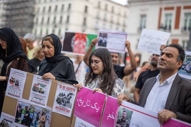 August 15, 2026, Madrid, Spain: MADRID, SPAIN Ã¢â‚¬ AUGUST 15, 2026: Afghan women, asylum seekers and feminist groups gather at Puerta del Sol in Madrid, Spain, on August 15, 2026, to mark five years since the Taliban returned to power in Afghanistan following the withdrawal of U.S. and NATO forces. Demonstrators denounced restrictions imposed on women and girls under Taliban rule and called for international action to defend their rights, describing the system of restrictions as Ã¢â‚¬oegender apartheid. Madrid Spain - ZUMAq101 20260815_zna_q101_135 Copyright: xC.xCarvajalx