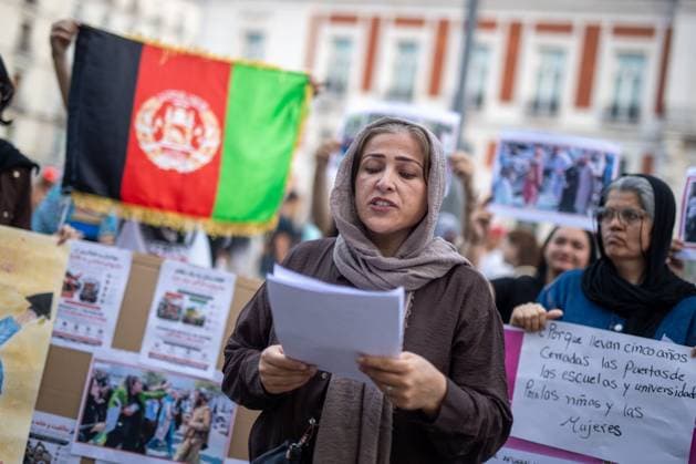 August 15, 2026, Madrid, Spain: MADRID, SPAIN Ã¢â‚¬ AUGUST 15, 2026: Afghan women, asylum seekers and feminist groups gather at Puerta del Sol in Madrid, Spain, on August 15, 2026, to mark five years since the Taliban returned to power in Afghanistan following the withdrawal of U.S. and NATO forces. Demonstrators denounced restrictions imposed on women and girls under Taliban rule and called for international action to defend their rights, describing the system of restrictions as Ã¢â‚¬oegender apartheid. Madrid Spain - ZUMAq101 20260815_zna_q101_136 Copyright: xC.xCarvajalx