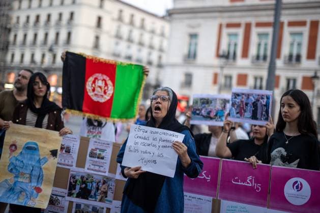 August 15, 2026, Madrid, Spain: MADRID, SPAIN Ã¢â‚¬ AUGUST 15, 2026: Afghan women, asylum seekers and feminist groups gather at Puerta del Sol in Madrid, Spain, on August 15, 2026, to mark five years since the Taliban returned to power in Afghanistan following the withdrawal of U.S. and NATO forces. Demonstrators denounced restrictions imposed on women and girls under Taliban rule and called for international action to defend their rights, describing the system of restrictions as Ã¢â‚¬oegender apartheid. Madrid Spain - ZUMAq101 20260815_zna_q101_137 Copyright: xC.xCarvajalx