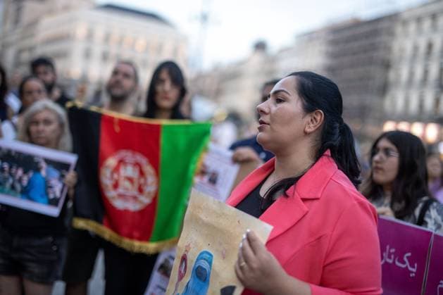August 15, 2026, Madrid, Spain: MADRID, SPAIN Ã¢â‚¬ AUGUST 15, 2026: Afghan women, asylum seekers and feminist groups gather at Puerta del Sol in Madrid, Spain, on August 15, 2026, to mark five years since the Taliban returned to power in Afghanistan following the withdrawal of U.S. and NATO forces. Demonstrators denounced restrictions imposed on women and girls under Taliban rule and called for international action to defend their rights, describing the system of restrictions as Ã¢â‚¬oegender apartheid. Madrid Spain - ZUMAq101 20260815_zna_q101_138 Copyright: xC.xCarvajalx