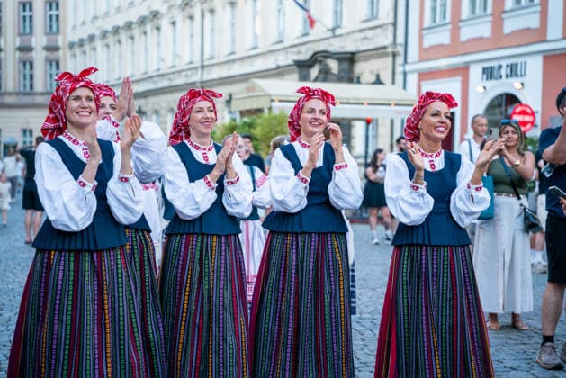 (260815) -- PRAGUE, Aug. 15, 2026 -- People attend the Summer Folklore Festival in Prague, the Czech Republic, Aug. 15, 2026. The Summer Folklore Festival was held in Prague on Saturday, bringing together international folklore ensembles presenting their traditional dances, music and costumes. (Photo by Xinhua) CZECH REPUBLIC-PRAGUE-FOLKLORE FESTIVAL DanaxKesnerova 